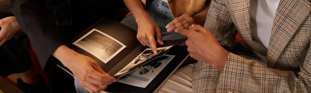 When Was This Picture Taken? Family Looking at Old Photos